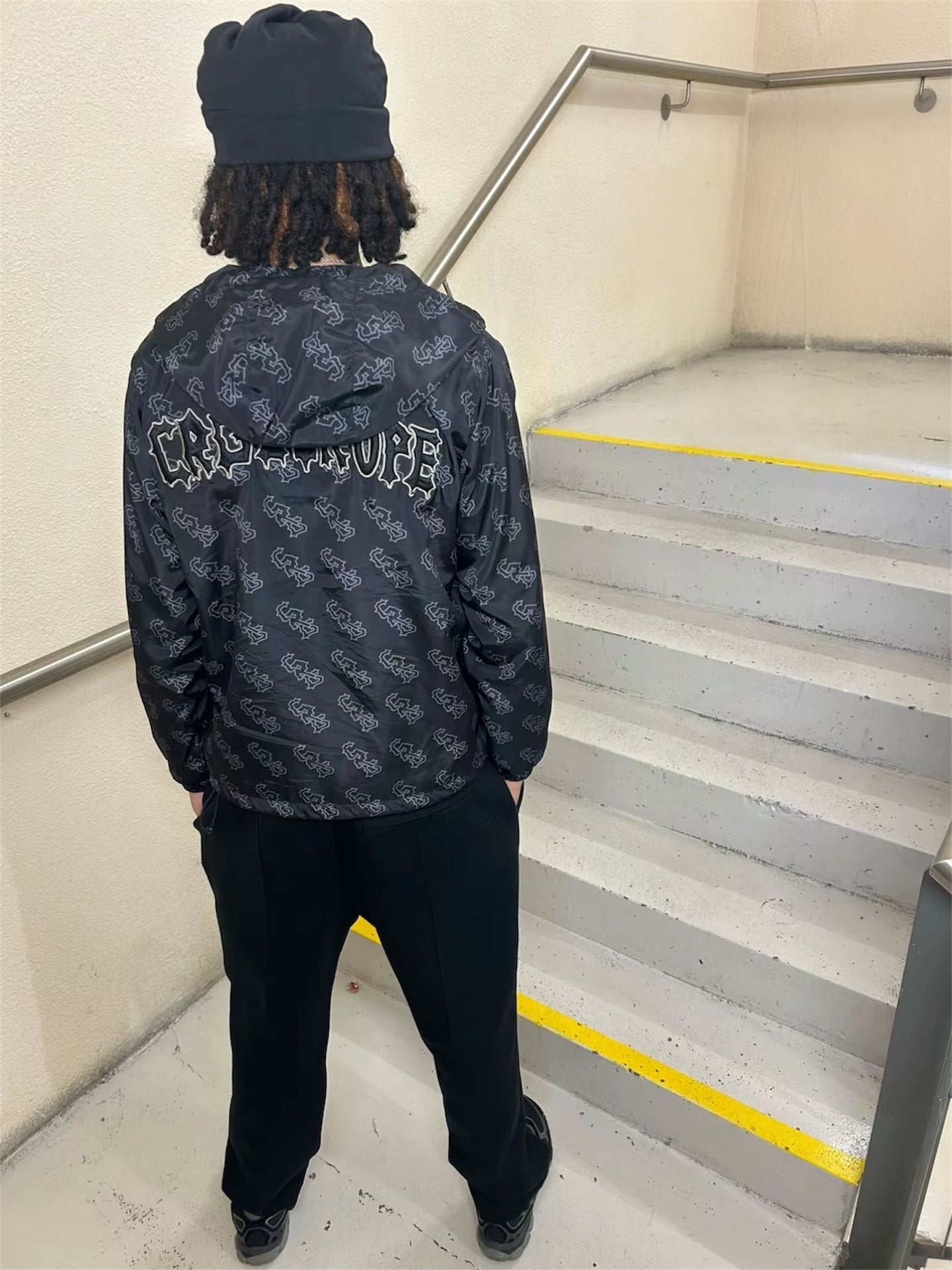 BLACK MONOGRAM WINDBREAKER