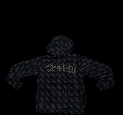 BLACK MONOGRAM WINDBREAKER