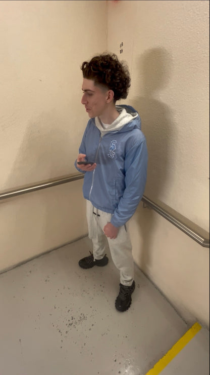 STEEL BLUE WINDBREAKER